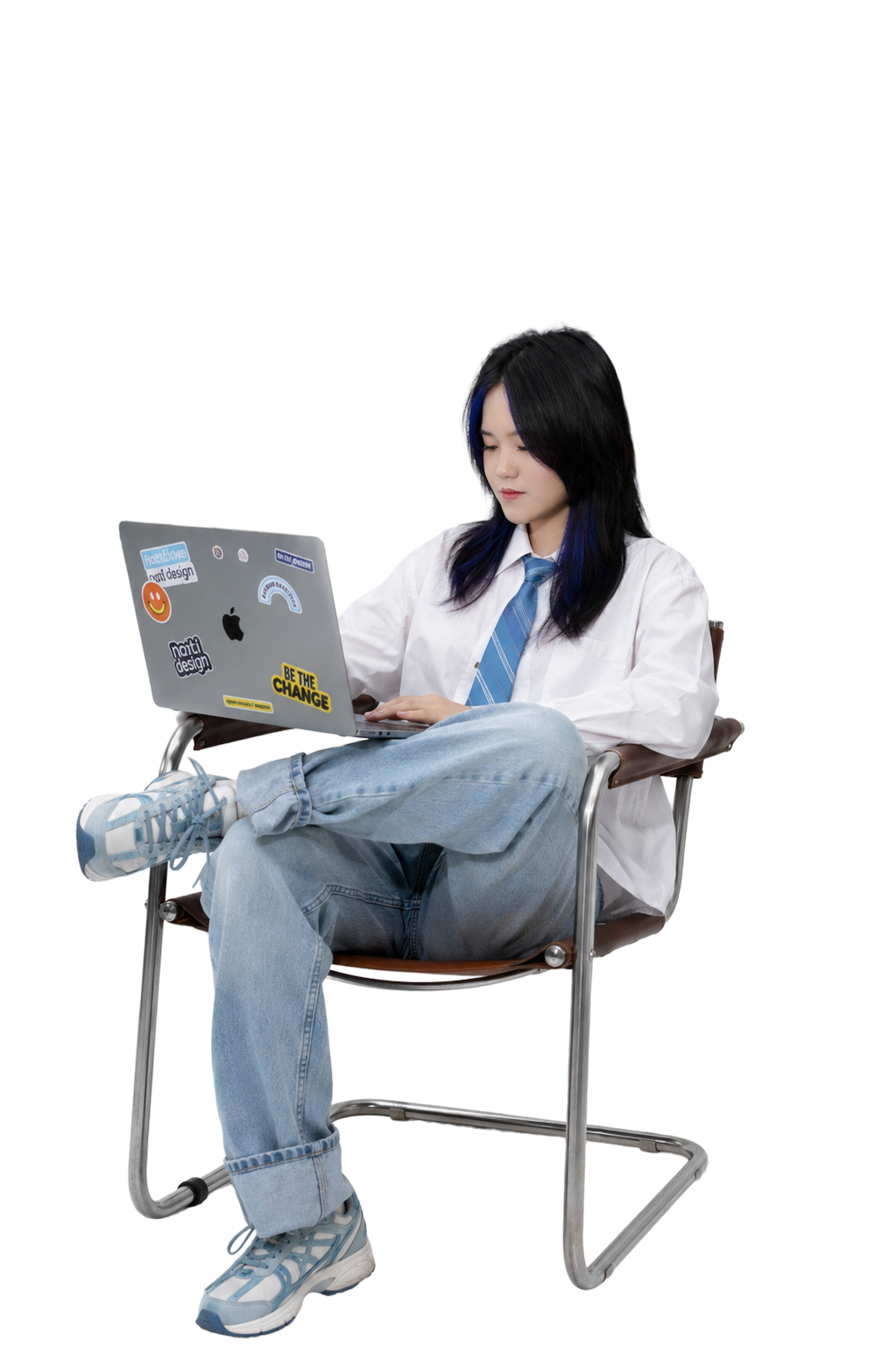 Emma working on a laptop